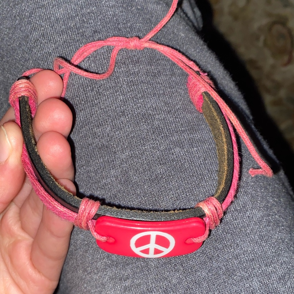 Pink peace sign bracelet